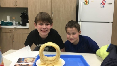 These pictures show the tweens while working on their pringle rings and with their completed pringle rings.
